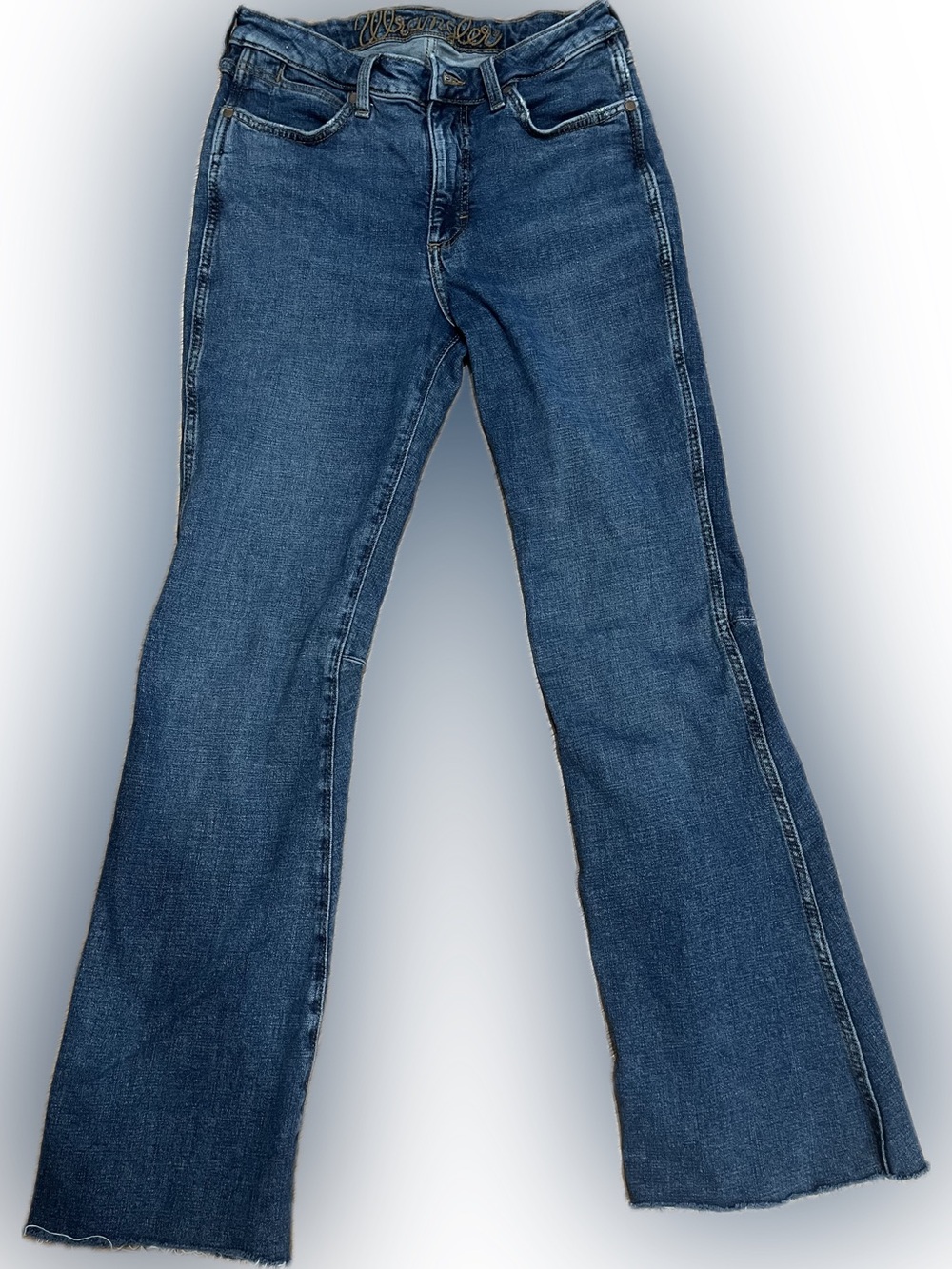 Really cool Wrangler Women's Blue Bootcut Jeans size 28 raw hem flare